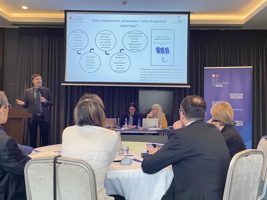Sead Alihodzic, Principal Adviser Elections, Conflict and Risk Management, is delivering information to the participants of the workshop.